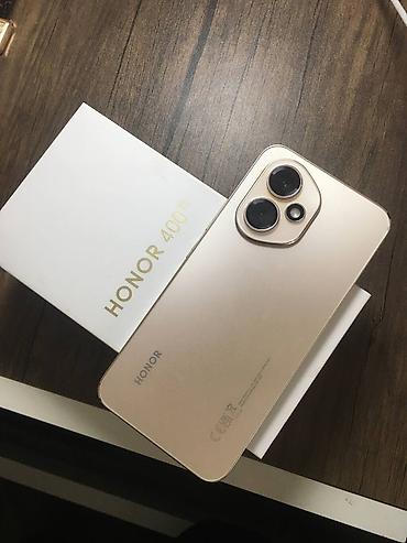 honor 100: Honor 400, 256 GB, rəng - Qızılı, Düyməli, Barmaq izi, İki sim kartlı — 1