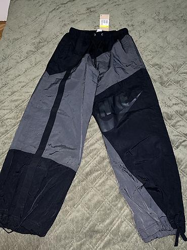 nine west papuče: NIKE Women's Sportswear Mid-Rise Street Woven Open-Hem Pants vel.S — 4
