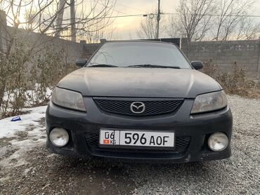 Mazda: Mazda 323: 2001 г., 1.6 л, Механика, Бензин, Хэтчбэк