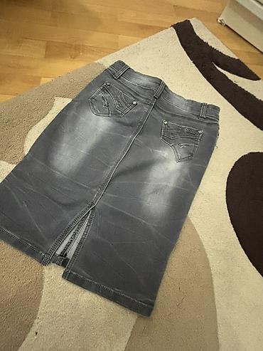Ətəklər: Denim ətək – boz rəng, klassik dizayn. - Material: cins (denim) — 2