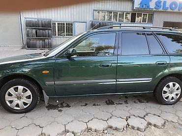 mazda 9: Mazda Capella: 2000 г., 2 л, Механика, Бензин, Универсал — 4