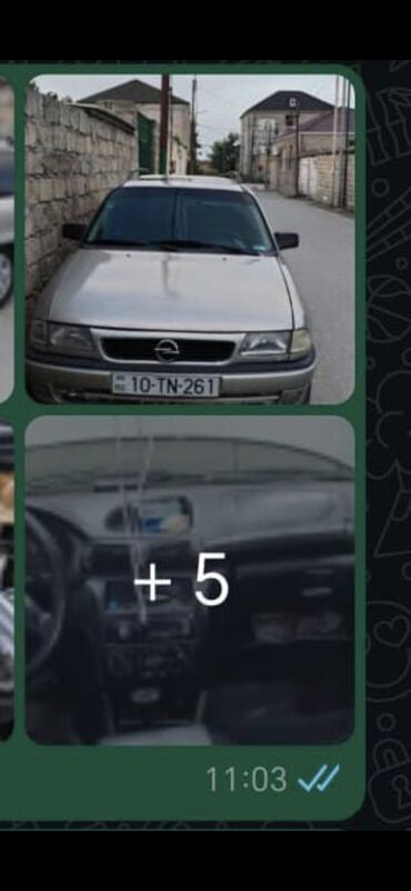 Opel Astra F Caravan, gümüşü rəngli, praktik və geniş avtomobildir