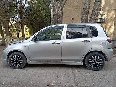Транспорт: Mazda Demio: 2004 г., 1.3 л, Автомат, Бензин, Хэтчбэк — 1