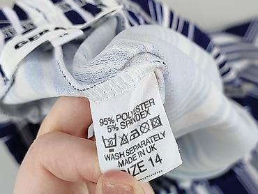 biale flared jeans: Spodnie materiałowe damskie, rozmiar XL — 5