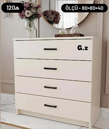 Komodlar: Ağ rəngdə, minimalist dizaynlı 4 çekmeceli komod. Sadə xətləri və qara — 1