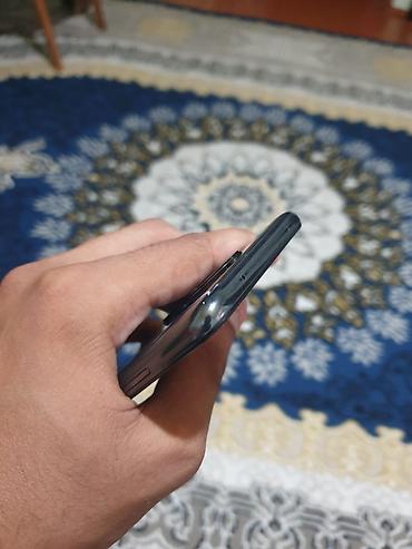 Digər mobil telefonlar: Smartfon – 6.5” təxmini tam ekranlı, ön kameranın ekranın yuxarı — 6