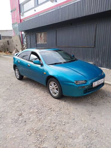 купить фронтальный погрузчик бу: Mazda 323: 1994 г., 1.5 л, Механика, Бензин, Седан