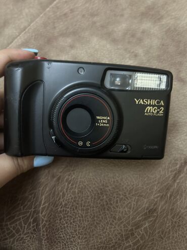 professionalnyi tsifrovoi fotoapparat: Пленочная 35 мм компактная фотокамера с миниальным набором настроек от