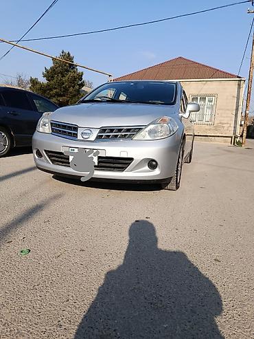 nissan mator: Nissan Tiida: 1.5 l | 2011 il Hetçbek — 2