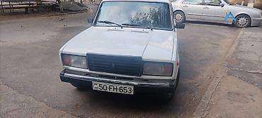 lada diskleri: Model: LADA (VAZ) 2107 Kuzov: sedan, ağ rəng Yanacaq: benzin Sürətlər — 3