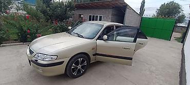 требуется тонар: Mazda Capella: 2000 г., 2 л, Автомат, Бензин, Седан — 2