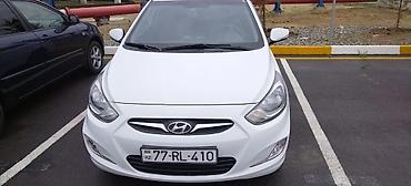 Hyundai Accent: 1.6 l | 2014 il Sedan