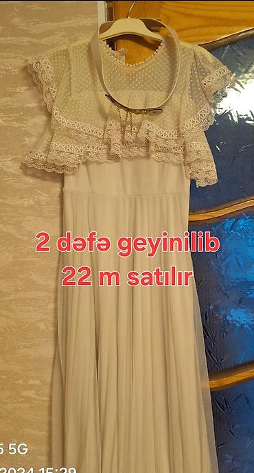 don sekilleri: - Ağ idman dəsti: fermuarlı üst, uzunqol, sinədə “World Model” loqosu — 4