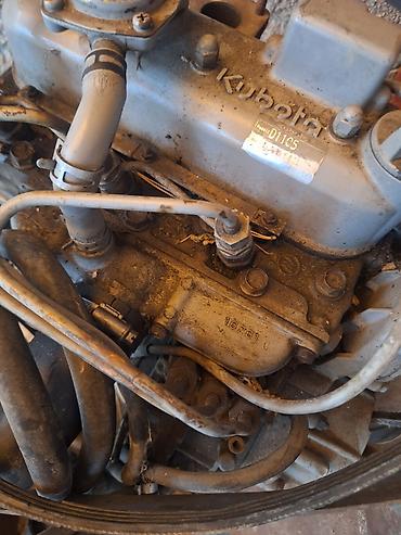 Мини-тракторы Kubota: Дизельный двигатель Kubota D1105 Тип: 3‑цилиндровый рядный дизель с — 4