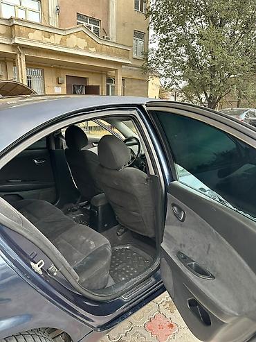 прицен: Nissan Primera: 2002 г., Седан — 8