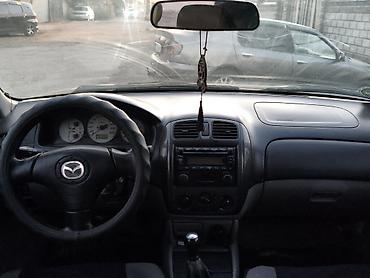Mazda 323: 2002 г., 1.6 л, Механика, Бензин, Хэтчбэк