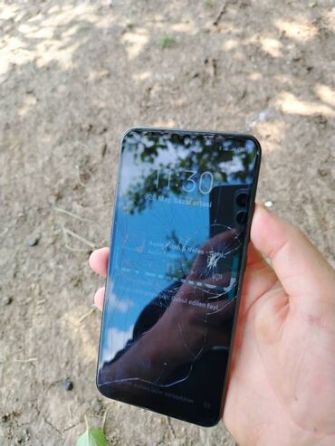 телефон fly б: Xiaomi Redmi 7, 32 ГБ, цвет - Черный, 
 Две SIM карты