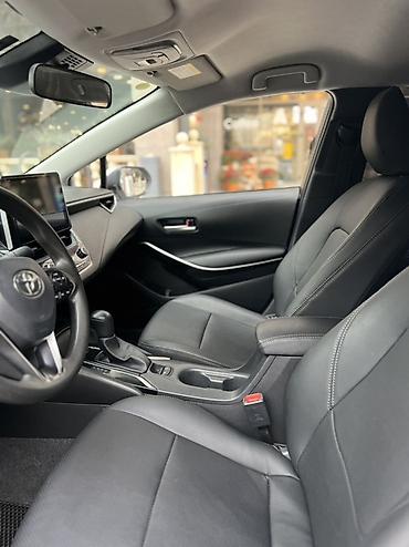 продажа гибридных автомобилей: Toyota Corolla: 2023 г., 1.8 л, Вариатор, Гибрид, Седан — 7