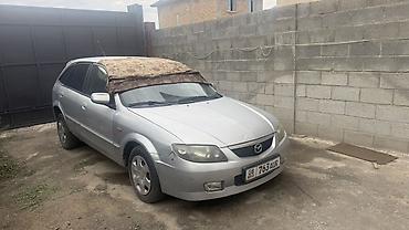 Транспорт: Mazda Familia: 2003 г., 1.6 л, Механика, Бензин, Универсал — 1