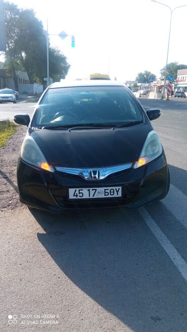 фит америка: Honda Fit: 2011 г., 1.3 л, Автомат, Гибрид, Седан