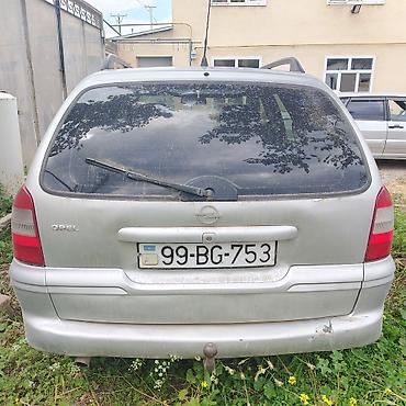 Opel: Opel unversal İli 2001 Karopka 5 skorustu Mator 1.8 Tex pasport qeyd — 2