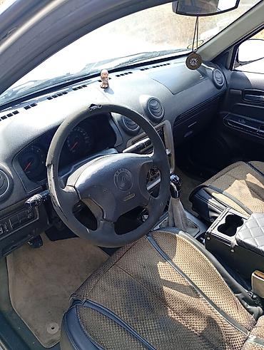 opel vectra b: Satılır: Gümüşü rəngli 4 qapılı sedan. Xüsusi yyətlər: - Kuzov — 6