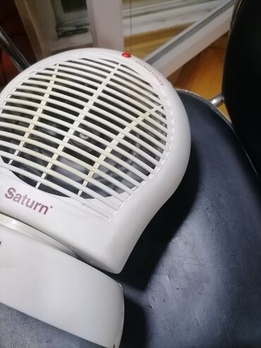 Kaloriferi: Grejalica duvaljka 2 brzine plus ventilator Saturn 2000w Okreće pri — 10
