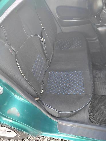 Mazda: Mazda Familia: 1997 г., 1.6 л, Автомат, Бензин, Седан — 8