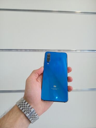 Xiaomi: Xiaomi Mi 9 SE, 64 GB, rəng - Göy, 
 Düyməli, Barmaq izi