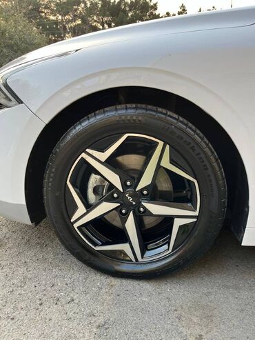 Kia: Kia K5: 1.6 l | 2021 il Sedan — 12