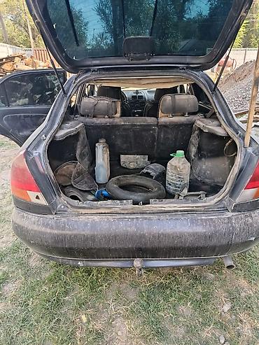 Другие детали кузова: Mitsubishi Carisma, хеджбек, серебристый цвет, все запчасти есть а — 9