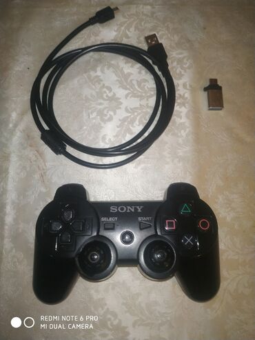 Video oyunlar üçün aksesuarlar: Sony DualShock 3 Sixaxis simsiz oyun pultu, PlayStation konsolları ilə