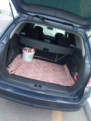 Opel: Opel Astra H – 5 qapılı hetçbek Xüsusiyyətlər: - Kuzov: tünd göy — 9