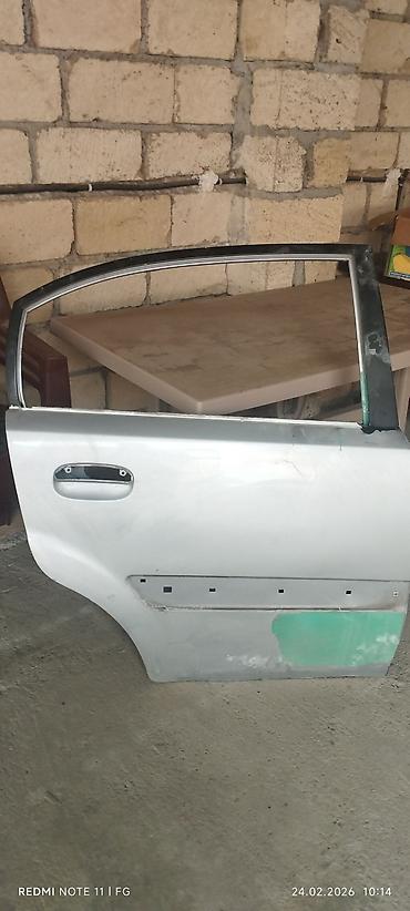 avtomobil ucun aksesuarlar: Kia Rio . Cütü 150 man Məhsul: Arxa sağ qapı – sedan/kuzov üçün metal — 1