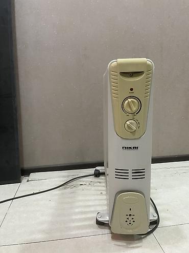 Техника и электроника: Nikai yağlı radiator tipli elektrik qızdırıcısı - Güc səviyyələri — 1