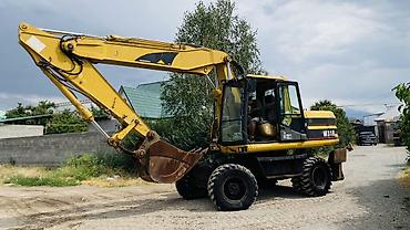 гусиничный экскаватор: Экскаватор, Caterpillar, Колесный — 1
