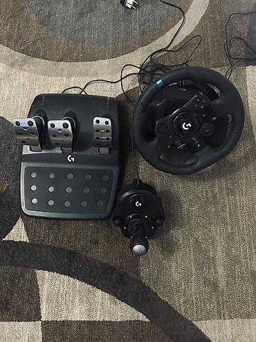 реалист: Игровой руль Logitech с педальным блоком и механической коробкой — 1