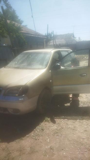 transporter multivan: Kia Carens: 1999 г. — 6