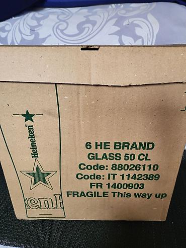 Čaše: Case nove za pivo Heineken. Case nove,sve na njima odsjaj od svetla — 3