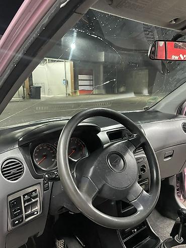 126 кузов: Daihatsu Cuore: 2004 г., 1 л, Механика, Бензин, Хэтчбэк — 5