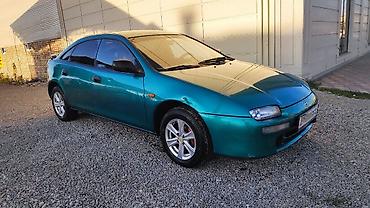 wel: Mazda 323: 1995 г., 1.5 л, Механика, Бензин, Хэтчбэк — 6