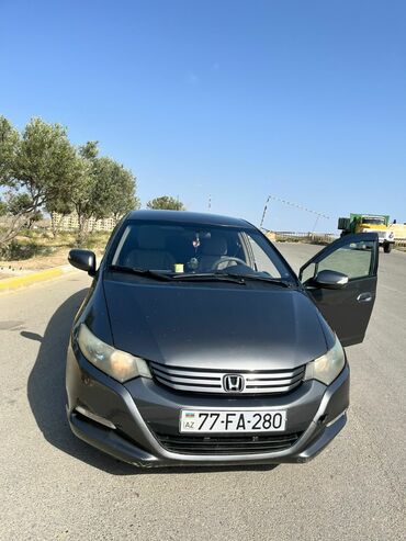 maşın oturacaqı: Honda Insight: 1.3 l | 2010 il Hetçbek