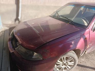 Daewoo Nexia: 2010 г., 1.5 л, Механика, Бензин, Седан