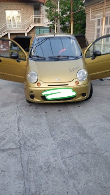 купить диски на матиз: Автомобиль Daewoo Matiz золотистого цвета, компактный хэтчбек с пятью