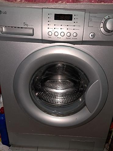 mini utu: LG paltaryuyan maşın – ön yükləməli, 5 kq tutumlu (model WD-10485N) — 1