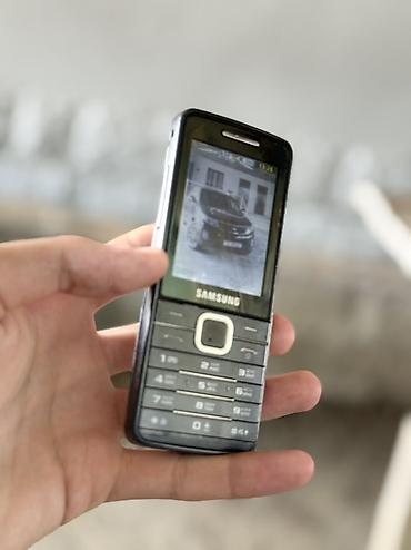 kontakt iphone 15 pro: Samsung S5610, rəng - Qara, Düyməli — 1
