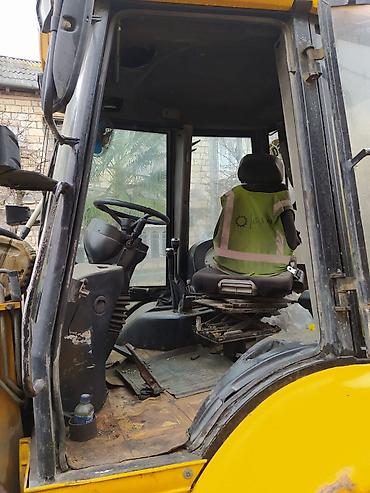 mtz 82 4x4: MST ekskavator-yükləyici (backhoe loader) - Marka/model: MST M5 — 10
