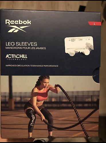 нове: REEBOK rukavi za noge vel.L 52-58cm NOVO — 1