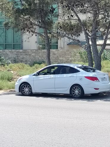 Hyundai Accent: 1.6 л | 2015 г. Седан