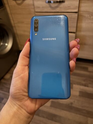 Samsung Galaxy A50, 64 ГБ, цвет - Синий, Face ID, Две SIM карты, Отпечаток пальца